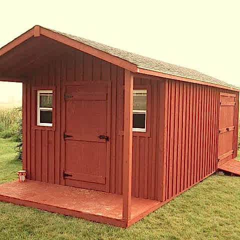 10 x 20 high board and batten with a 4 foot gable porch.